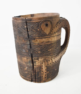 Lot 161 - A 19th century treen tankard of large...