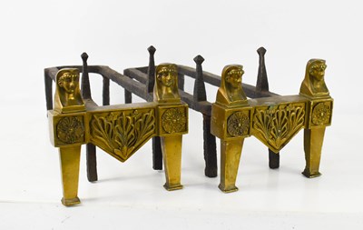 Lot 105 - A pair of Egyptian revival brass and iron...