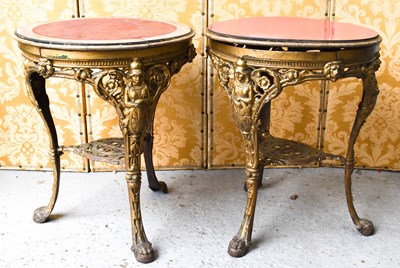 Lot 548 - A pair of Britannia 1920s cast iron pub tables,...