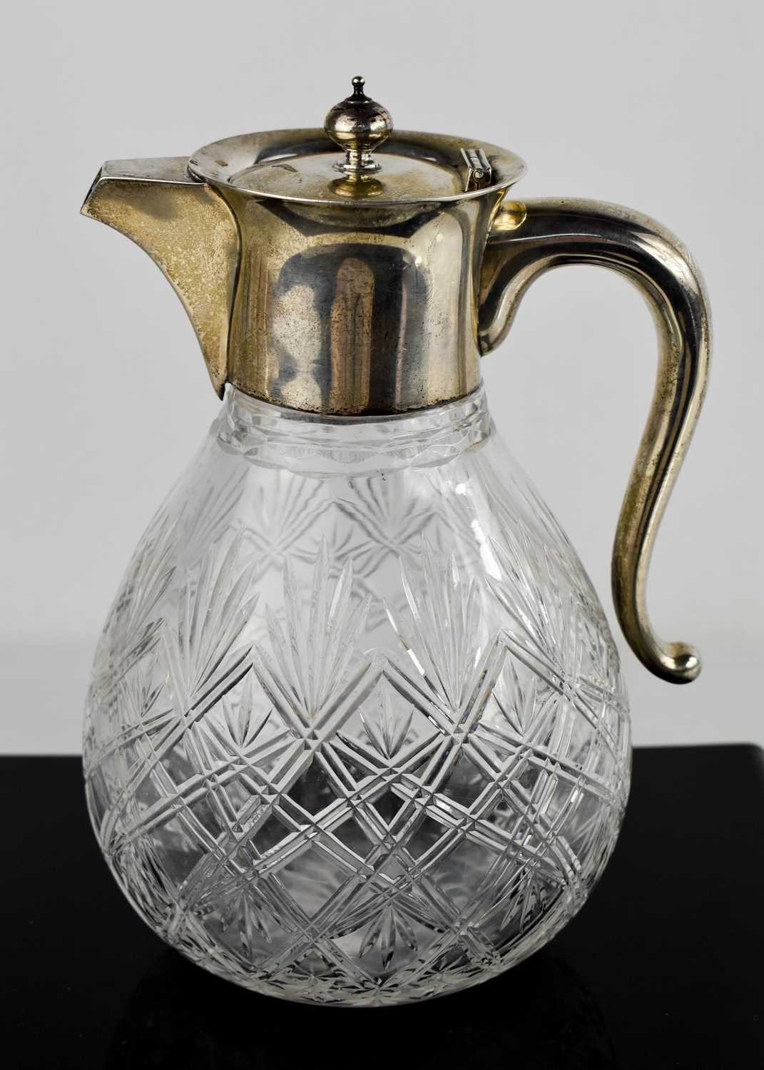 Lot 275 - A Victorian silver and cut glass claret jug,...