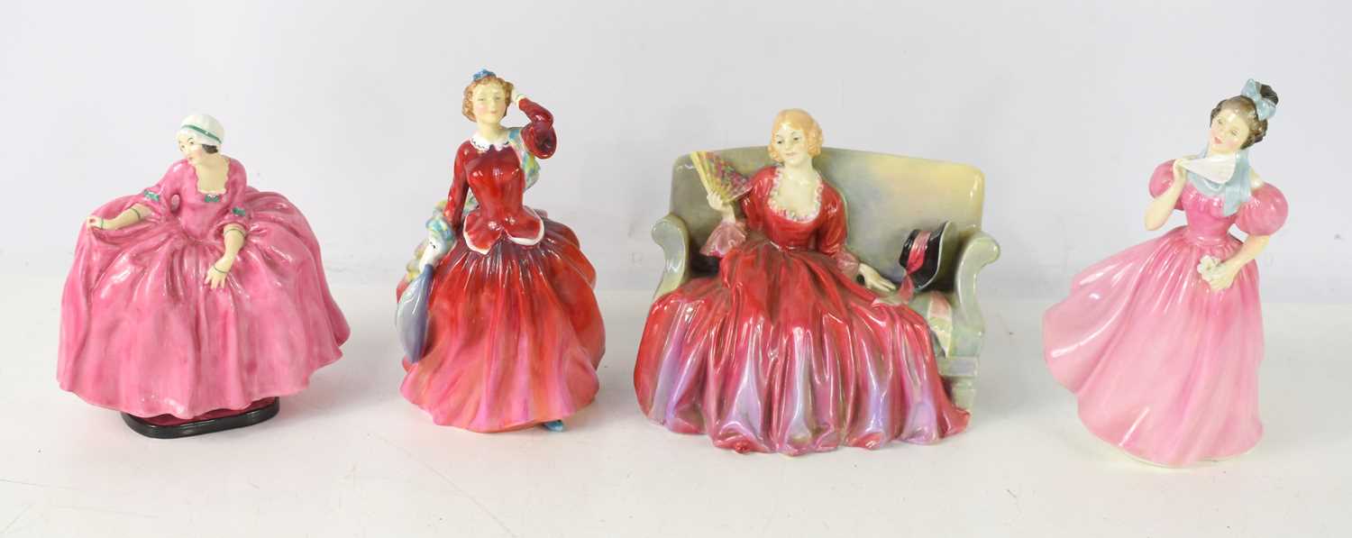 Lot 425 - A group of four Royal Doulton figurines...