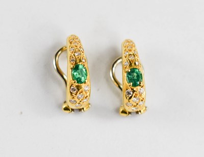 Lot 133 - A pair of 18ct gold, diamond and emerald...