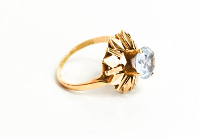 Lot 6 - A 9ct gold and aquamarine modernist ring, the...
