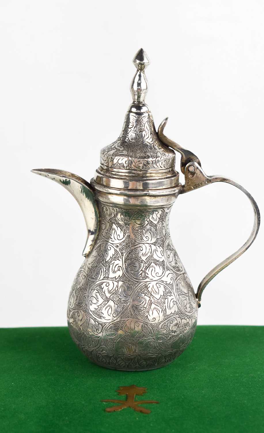 Lot 266 - An Indonesian silver teapot, of baluster