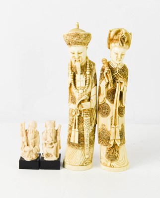 Lot 262 - A pair of 20th century Chinese ivorine figures...