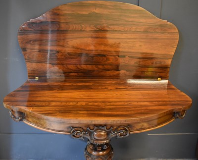 Lot 660 - A fine VIctorian rosewood card table with...