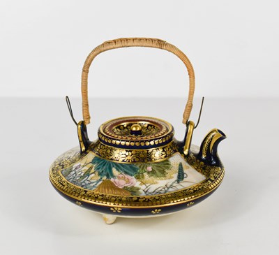 Lot 27 - A fine Qing Dynasty Chinese teapot of squat...