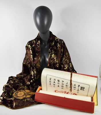 Lot 163 - A Chinese satin dressing gown, the brown...