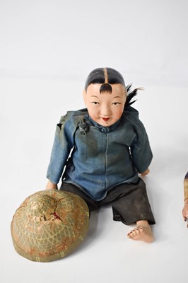 Lot 126 - A Chinese doll, dressed traditionally as a...