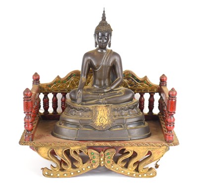 Lot 99 - A Tibetan bronze figure of Buddha Vajraasanna...