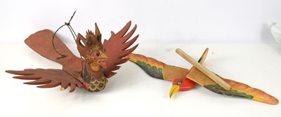 Lot 281 - A Balinese carved wooden winged dragon...