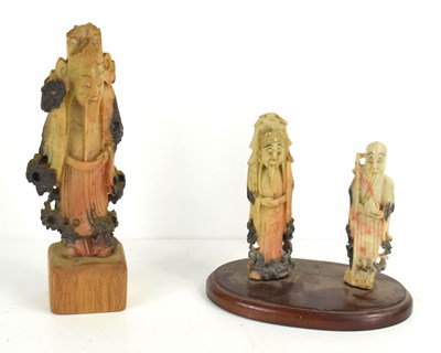 Lot 88 - Three Chinese carved soapstone figures of...