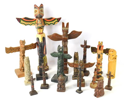 Lot 268 - A group of Native American totem poles, to...