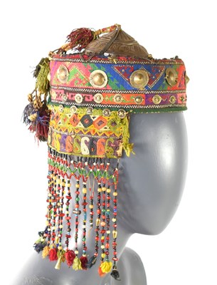 Lot 195 - A 19th century embroidered and beaded hat,...