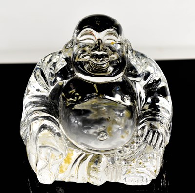 Lot 23 - A Chinese crystal seated Buddha, 9cm high.