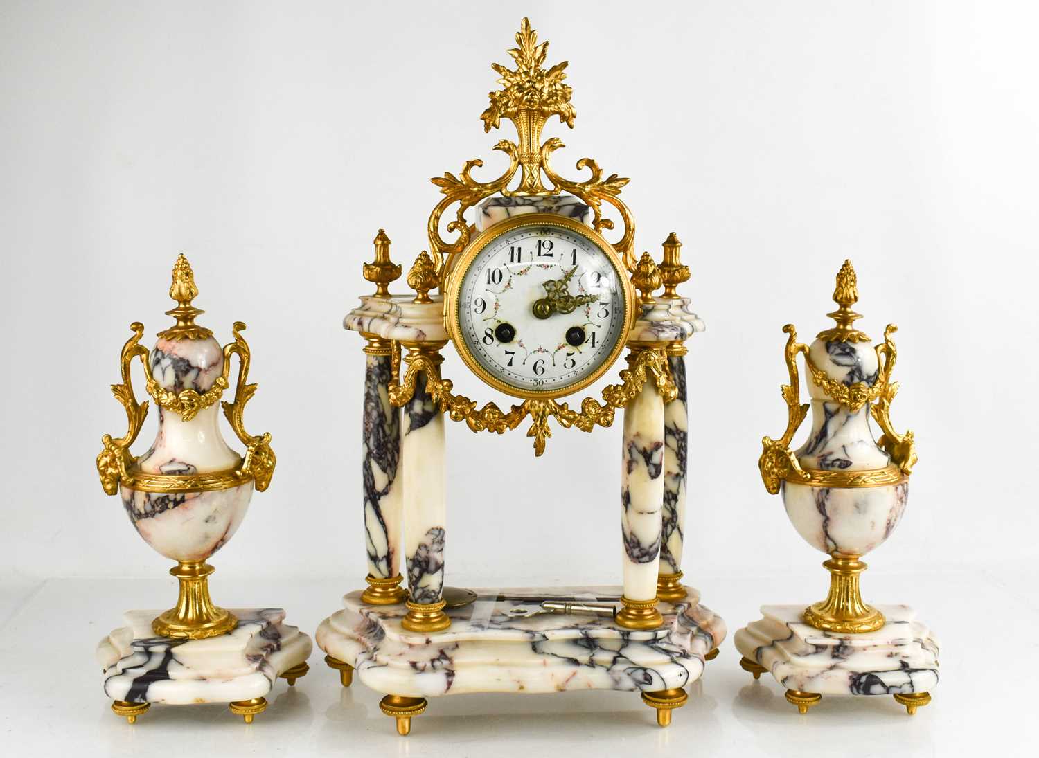 Lot 205 - A 19th century French marble and gilt clock...