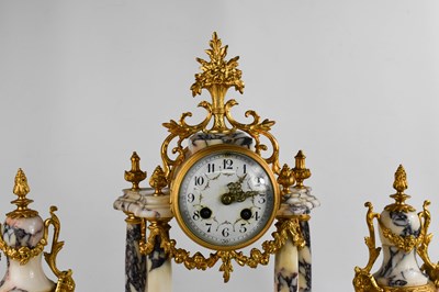 Lot 205 - A 19th century French marble and gilt clock...