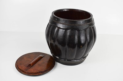 Lot 264 - A Chinese Qing Dynasty wooden rice jar and...