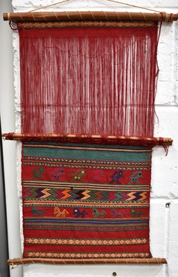 Lot 275 - A woven woolen wall hanging, Native American,...