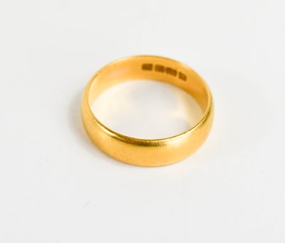 Lot 131 - A 22ct gold wedding band, size P/Q, 5.8g.