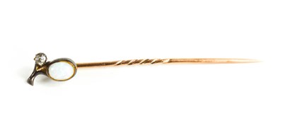 Lot 47 - A gold, opal and diamond hat pin, the oval...