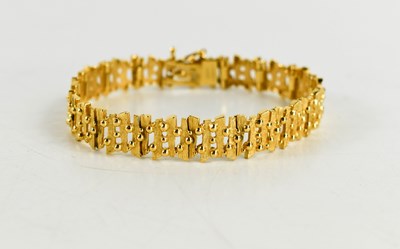 Lot 16 - A 9ct gold bracelet, composed of modernist...