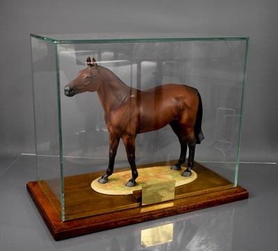 Lot 137 - A 20th century porcelain model of Red Rum, in...