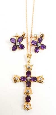 Lot 133 - A 14ct gold, diamond and amethyst pendant, the...