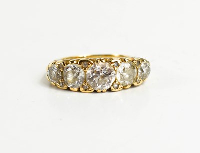 Lot 28 - A gold and diamond five stone ring, the old...