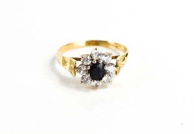 Lot 98 - A 9ct gold, diamond and sapphire ring, of...