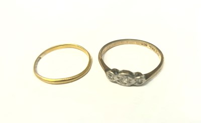 Lot 93 - A 22ct gold wedding band, size I, together...