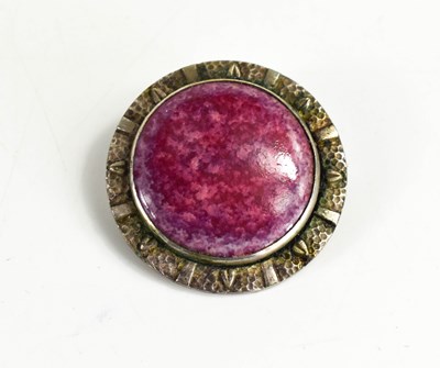 Lot 31 - A Ruskin pottery and silver brooch, the pink...