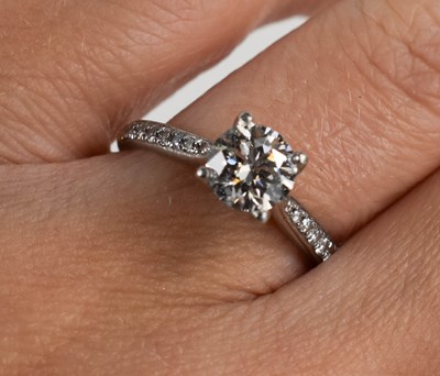 Lot 27 - A solitaire diamond and 950 platinum ring, the...