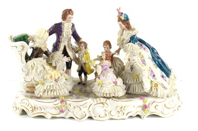 Lot 205 - A continental porcelain figure group of a...