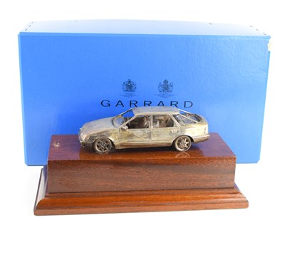 Lot 416 - A silver Ford Scorpio by Garrard & Co,...