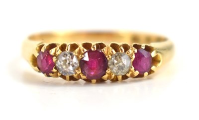 Lot 135 - An 18ct gold, ruby and diamond five stone ring...