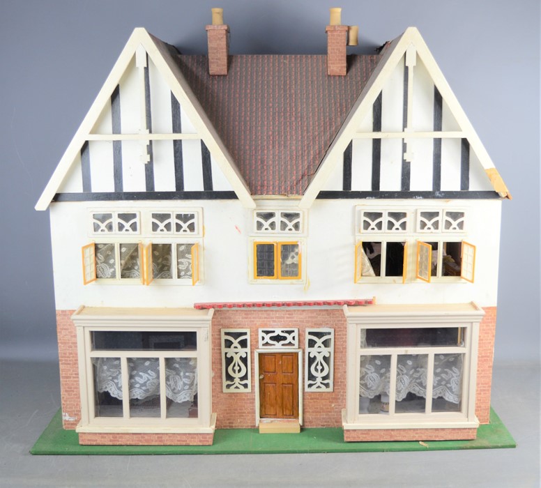 Lot 487 A vintage handmade dolls house complete with