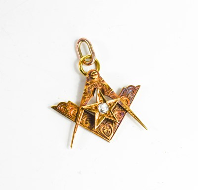 Lot 45 - An 18ct gold Masonic charm / pendant, engraved...