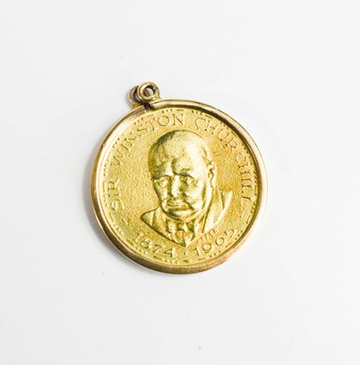 Lot 141 - An 18ct gold Churchill memorial coin in a gold...
