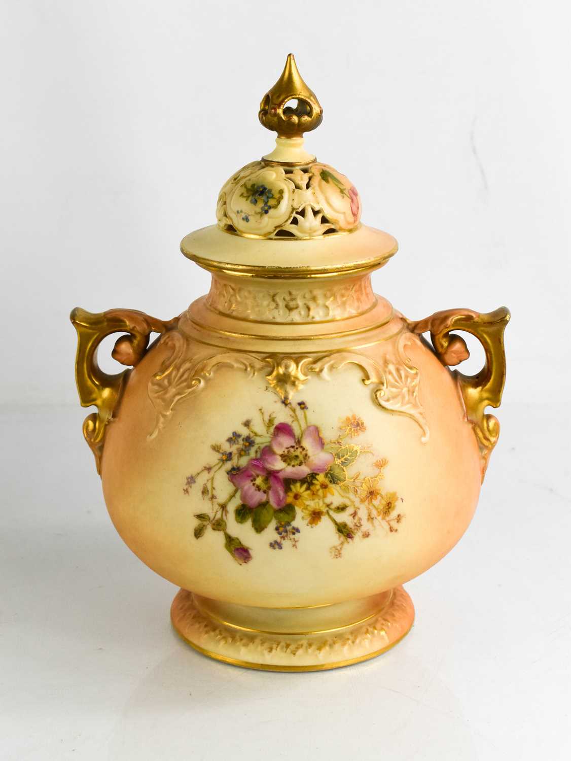 Lot 18 - A Royal Worcester blush ivory vase, and cover...