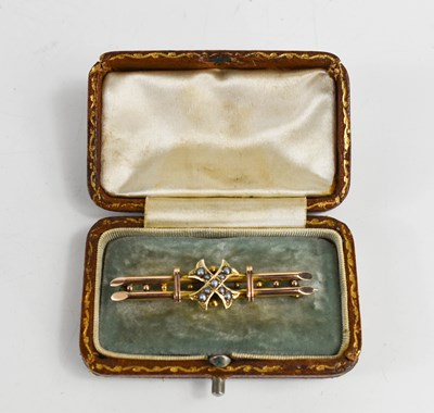Lot 54 - A 9ct gold Victorian brooch, the central cross...