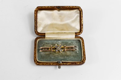 Lot 54 - A 9ct gold Victorian brooch, the central cross...