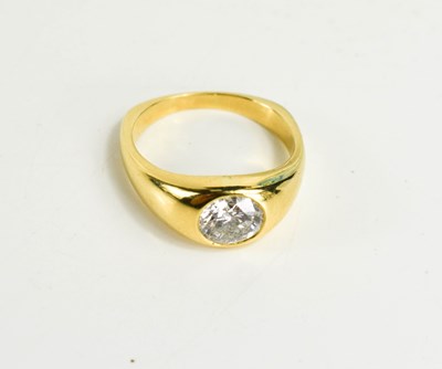 Lot 26 - An 18ct gold and diamond solitare ring, the...