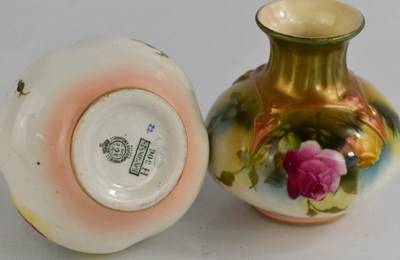 Lot 32 - A pair of Royal Worcester vases painted with...