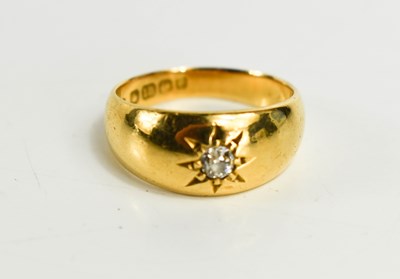 Lot 143 - An 18ct gold and diamond gypsy ring, the...