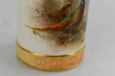 Lot 33 - A Royal Worcester vase, painted with pheasants...