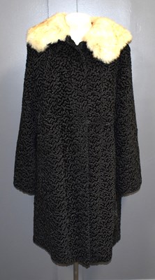 Lot 481 - A vintage Astragan coat with fur collar.