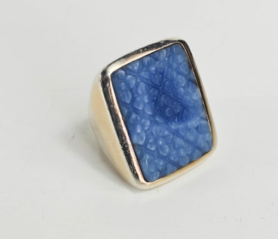 Lot 39 - A large Sterling silver ring with a large blue...