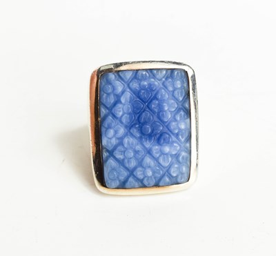 Lot 39 - A large Sterling silver ring with a large blue...