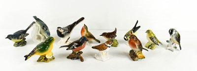 Lot 157 - A group of Beswick and Goebel birds, including...